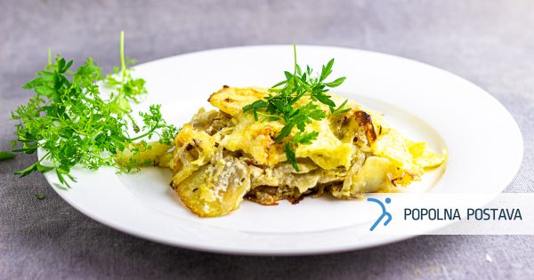 Pečen krompir s cheddar sirom v pečici